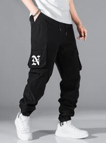 Manfinity Hypemode Men Letter Graphic Flap Pocket Drawstring Waist Cargo Trousers - Black - View 1