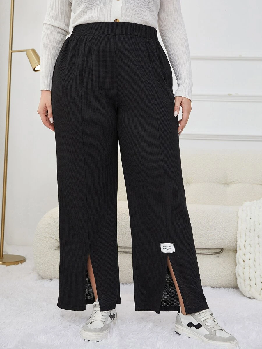 Mulvari Plus Letter Patched Detail Split Hem Trousers - Black - View 1