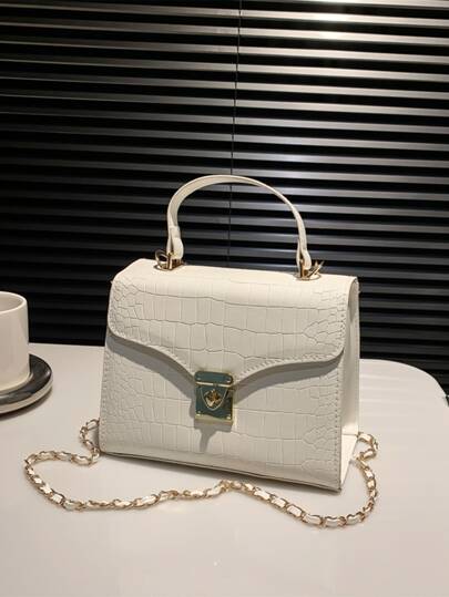 幾何浮雕金屬裝飾翻蓋方包