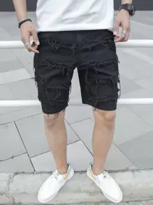 Manfinity EMRG Hombres Shorts en mezclilla algodón desgarro crudo con bolsillo oblicuo - Negro - Ver 1