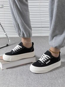 女款時尚黑色帆布休閒鞋，配輕量防滑平底鞋底，圓頭設計，鞋帶式閉合，適用於戶外活動，適用於春夏季節。 - 黑色 - 查看 1