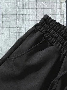 Manfinity Homme Quần short cạp rút họa tiết hoạt hình cho nam, quần short thường ngày đi chơi, quần short có dây rút, dành cho chồng, quà tặng bạn trai, quần short hoạt hình cho nam - màu đen - Xem 5