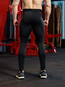 Men Solid Sports Tights & Phone Pocket - Black - View 2