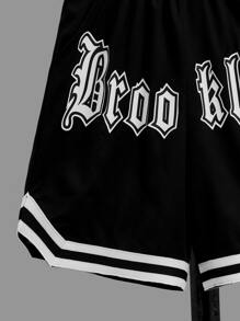 SHEIN 青少年男孩字母印花圖案和條紋邊運動短褲