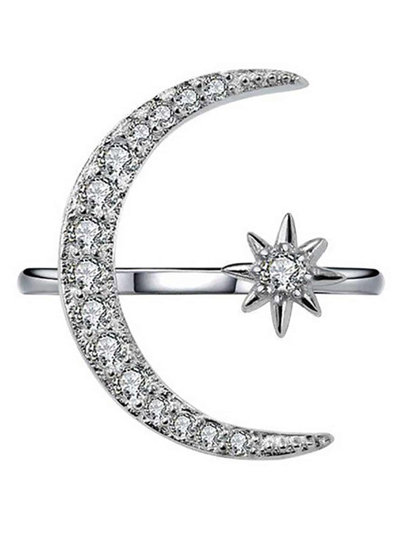 Anillo abierto con diseño de estrella y luna