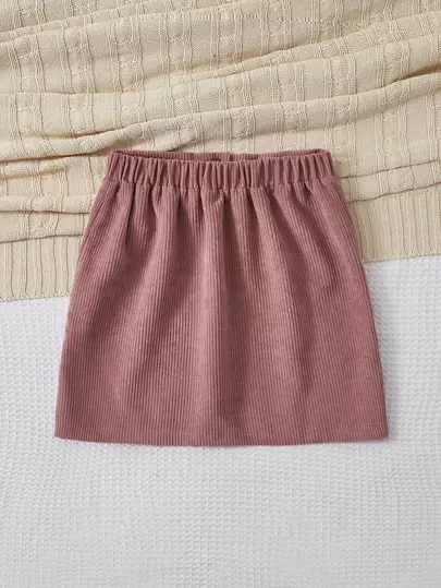 SHEIN Falda De Pana Para Niñas Preadolescentes Con Botones Frontales Y Doble Bolsillo