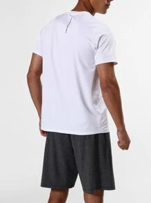 Manfinity Sport Corelite Conjunto deportivo para hombres con camiseta de manga raglán y pantalones cortos, traje atlético, conjunto de pantalones cortos - Multicolor - Ver 2