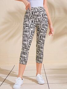 EMERY ROSE Women's Casual High-Waisted Graphic Printed Cropped Leggings Tights Capris - Black and White - View 1