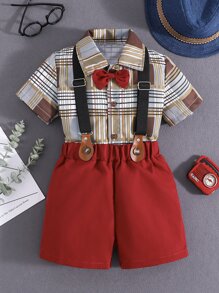 小男童格紋前蝴蝶結襯衫和背帶短褲