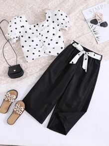 女孩波卡圓點褶邊泡泡袖上衣和闊腿褲