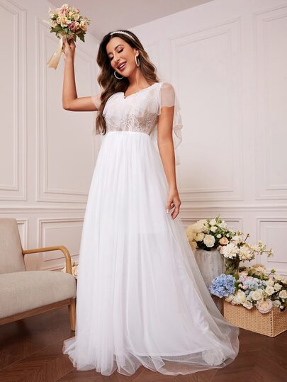 Vestido de novia de unicolor con encaje, malla de contraste y volantes