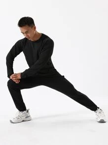 Hombres Camiseta deportiva unicolor de manga raglán - Negro - Ver 5