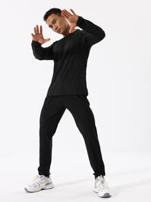 Hombres Camiseta deportiva unicolor de manga raglán - Negro - Ver 6