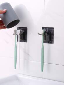 1 pieza negro montado en la pared Cepillo de dientes almacenamiento de plástico a prueba de polvo montado en la pared adhesivo Cepillo de dientes almacenamiento Organizador estante Estante