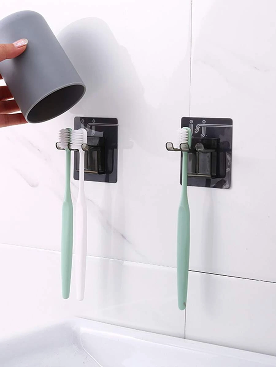 1 pieza negro montado en la pared Cepillo de dientes almacenamiento de plástico a prueba de polvo montado en la pared adhesivo Cepillo de dientes almacenamiento Organizador estante Estante