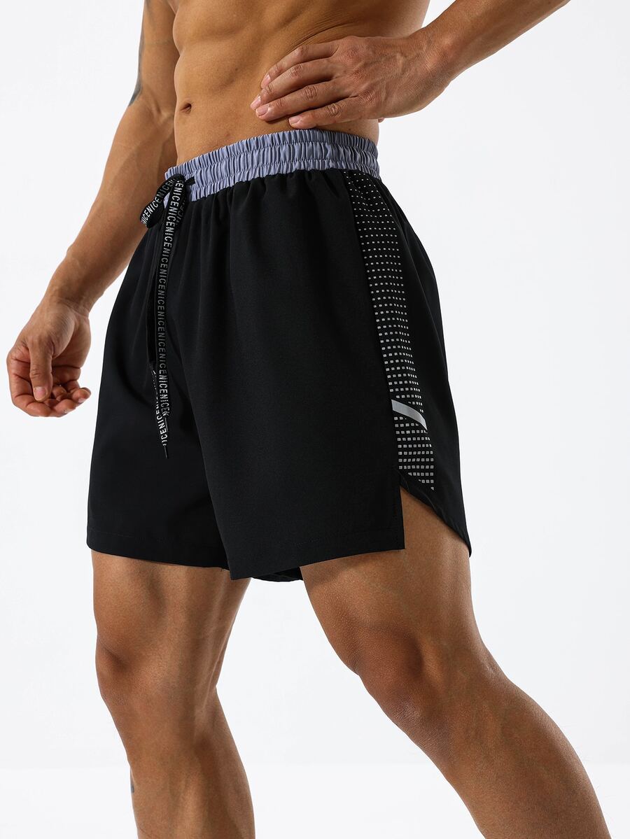 Manfinity Sport Corelite Pantalones cortos deportivos para hombres con estampado geométrico y cintura con cordón, pantalones cortos negros - Negro - Ver 1