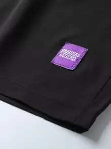 Manfinity Hypemode Uso diario casual para hombres, perfecto para salidas y vacaciones, con un estilo INS de pantalones cortos casuales sueltos de alto rendimiento. Los pantalones cortos tienen un diseño con parche de letras y cintura con cordón, y son pantalones cortos casuales con cordón.