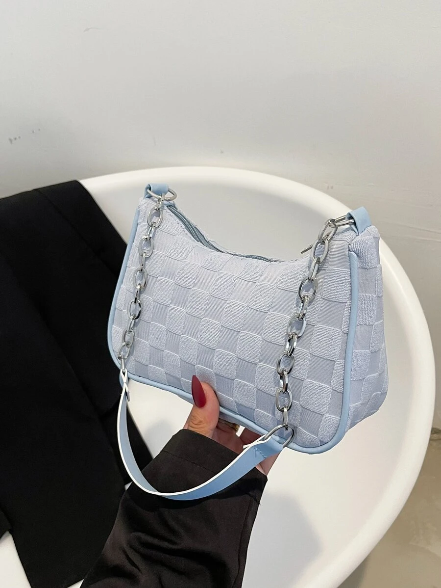 Bolso hobo en relieve geométrico