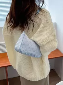Bolso hobo en relieve geométrico