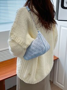 Bolso hobo en relieve geométrico