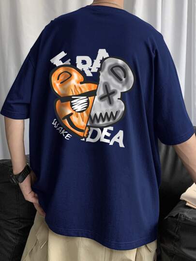 Camiseta Holgada De Los Hombres Con Impresión De Dibujos Animados Y Letras Con Hombros Caídos