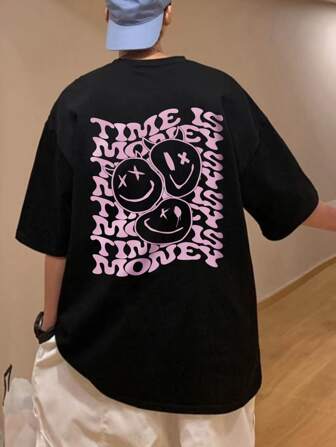 T-shirt à épaules tombantes avec graphique de dessin animé et slogan pour homme