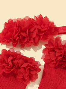 1雙嬰兒花朵裝飾襪子和1入組髮帶