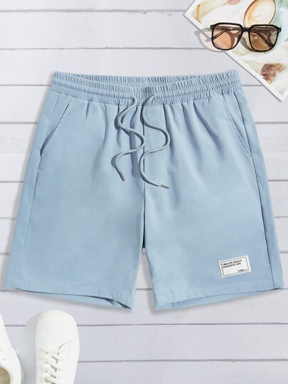 Uomo Shorts con toppa lettera con coulisse a vita
