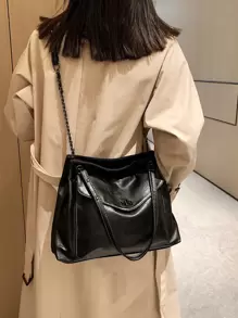 Bolso tote con cerradura girante de hombros con cadena