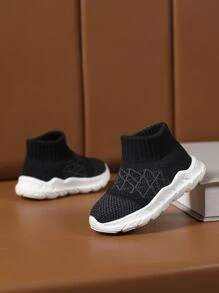 男孩一腳蹬高幫運動鞋黑色戶外襪型運動鞋