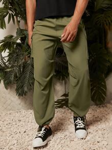 Manfinity RelaxMax Hombres Pantalones unicolor con bolsillo lateral con solapa - Verde militar - Ver 3