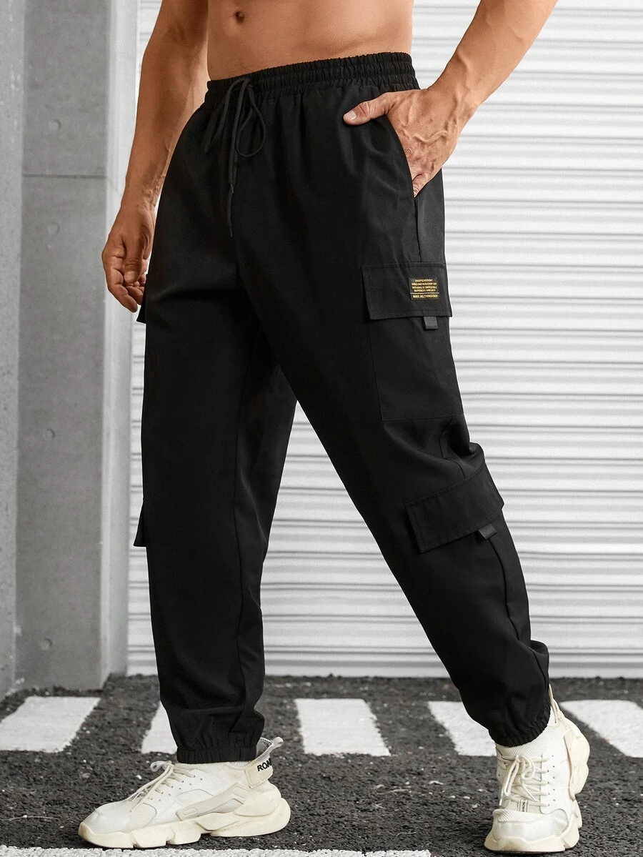 Manfinity Men Letter Patched Detail Flap Pocket Side Drawstring Waist Cargo Trousers - Black - View 1