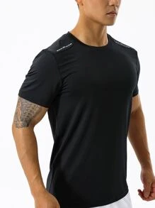 Manfinity Sport Corelite Camiseta deportiva de hombre de color sólido, tops para hacer ejercicio, tops transpirables para el entrenamiento
