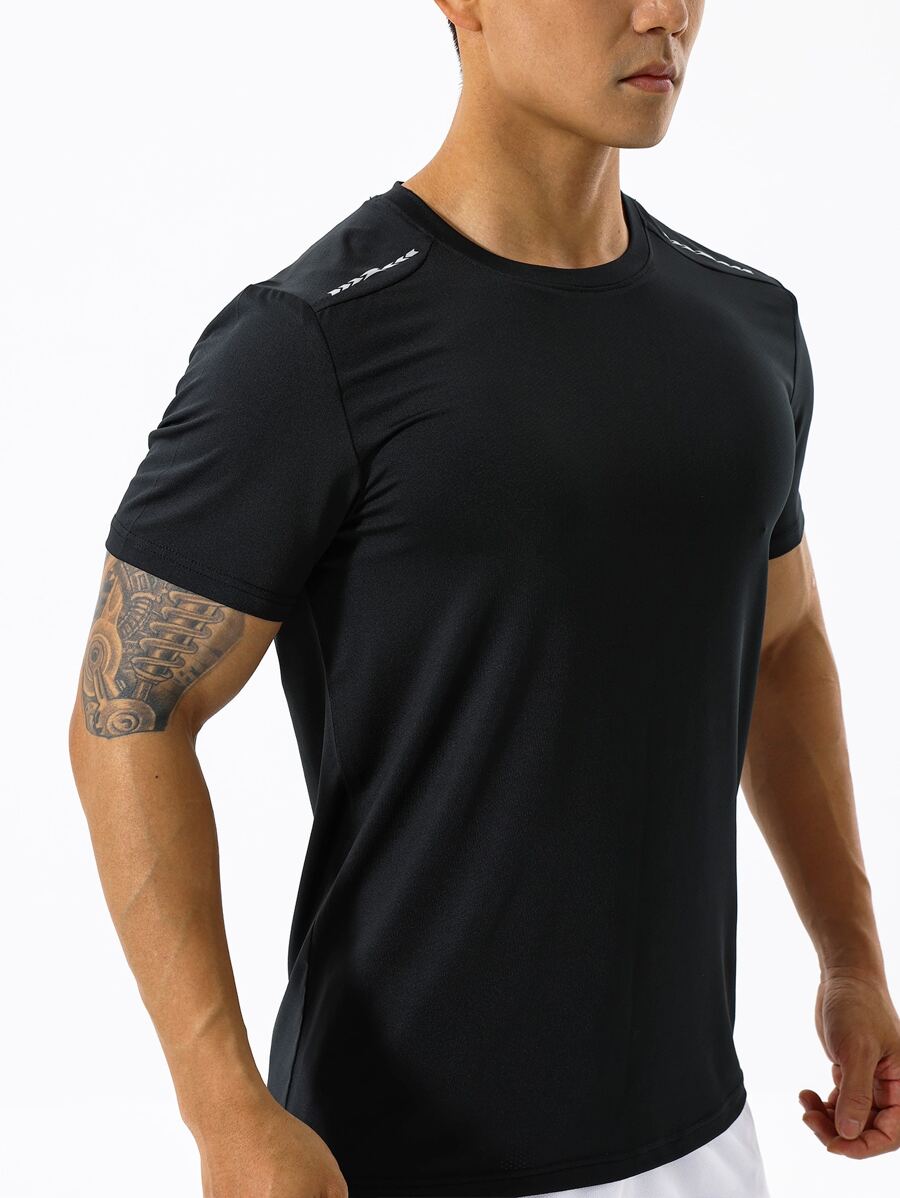 Manfinity Sport Corelite Camiseta deportiva de hombre de color sólido, tops para hacer ejercicio, tops transpirables para el entrenamiento