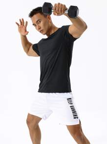 Manfinity Sport Corelite Camiseta deportiva de hombre de color sólido, tops para hacer ejercicio, tops transpirables para el entrenamiento
