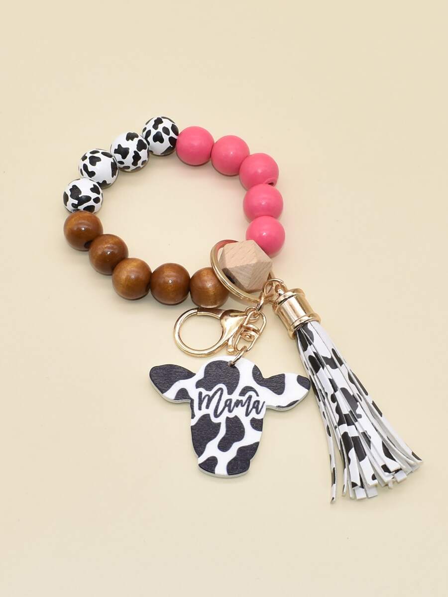 Móc Khóa Charm Đầu Bò & Tua Rua - Màu Hồng Tươi - Xem 1