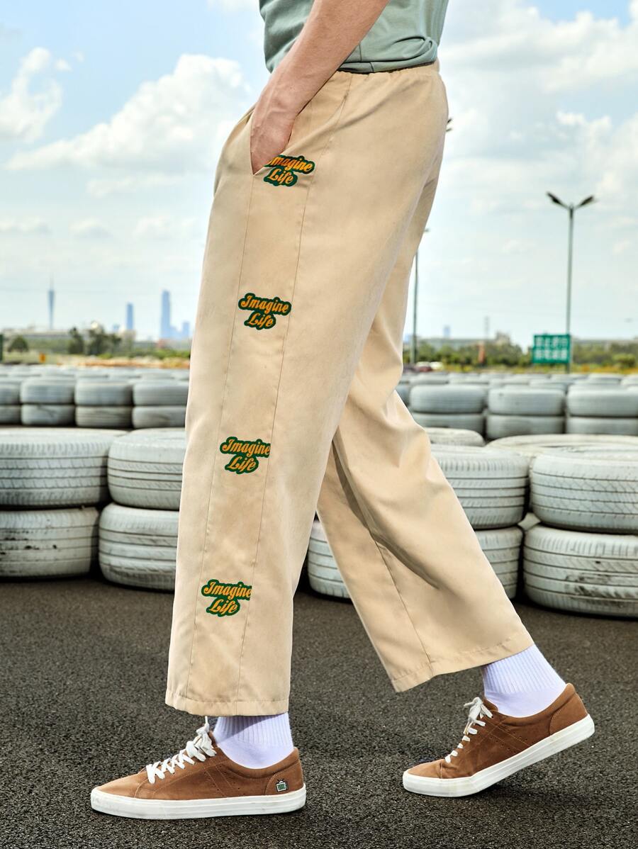 Manfinity Hypemode 男子寬鬆字母圖形束腰長褲 - 杏色 - 查看 1