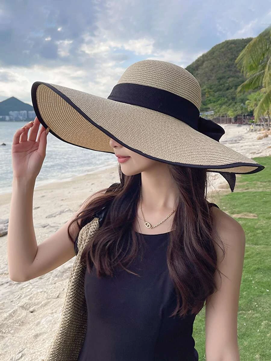 一頂女士遮陽帽，帶蝴蝶結肩帶，可摺疊寬邊遮陽帽，適用於海灘和防曬 - 米色 - 查看 1