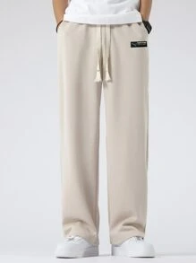 Chillumni 男式寬鬆褲子,帶有字母拼接細節和束口腰帶 - 米色 - 查看 4