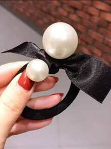 蝴蝶結和人造珍珠裝飾髮圈