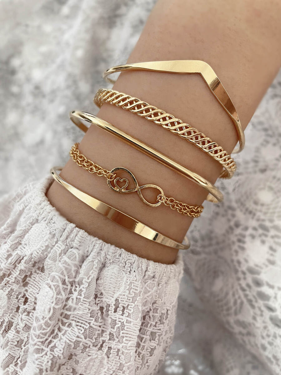 Set de 5 pulseras doradas con diseño de corazón e infinito para hombres y mujeres - Ver 1