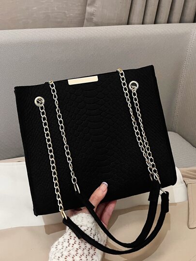 Bolsa cuadrada con piel de serpiente en relieve con cadena