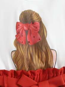 青少女圖形t卹和紙袋腰帶裙