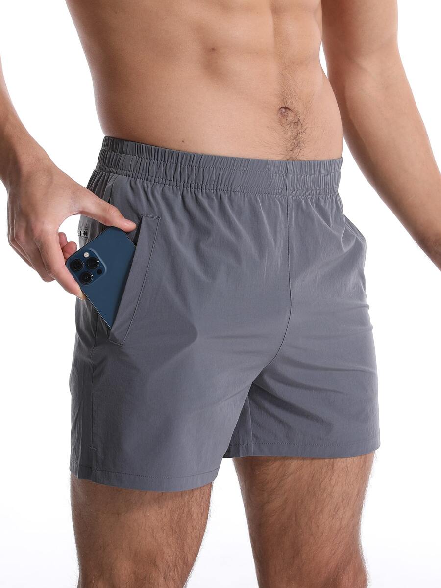男士拉鍊口袋運動短褲帶手機袋