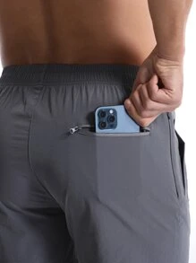 男士拉鍊口袋運動短褲帶手機袋