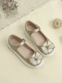 運動板鞋適用於女孩金屬質感蝴蝶結裝飾踝帶運動鞋