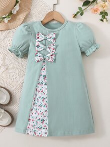小女童碎花前蝴蝶結泡泡袖洋裝