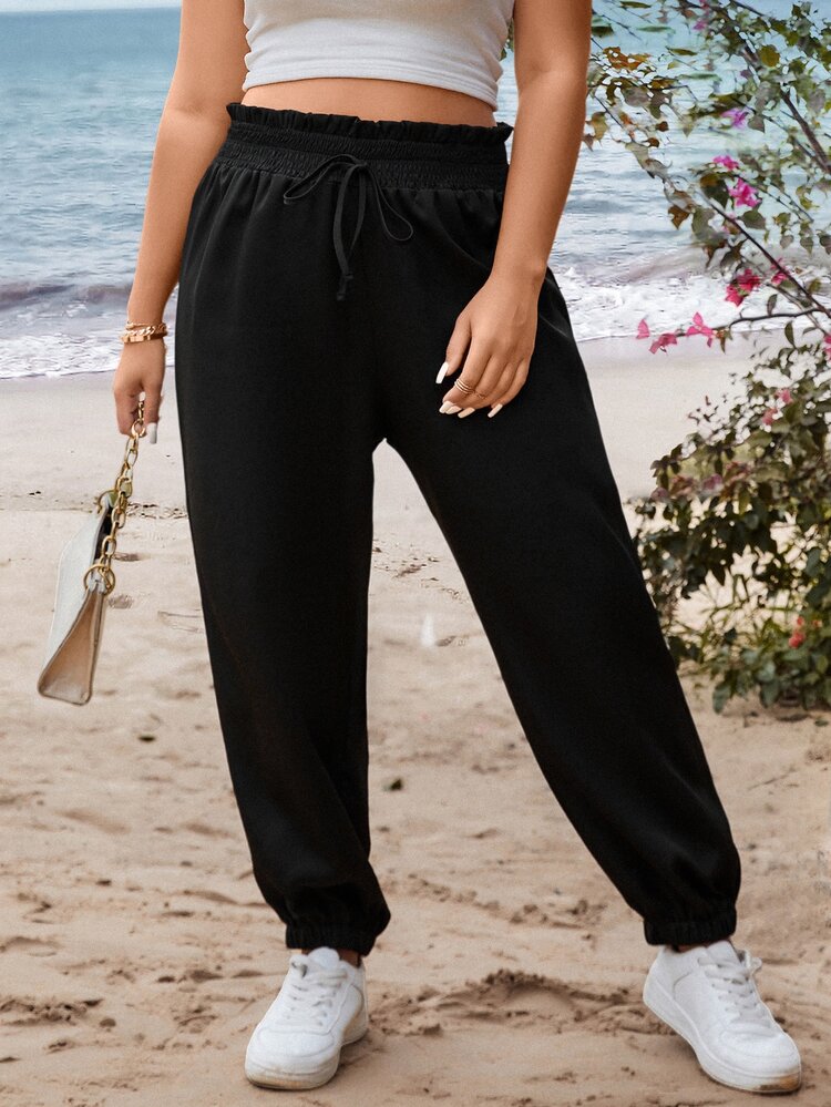 Flirla Pantalones de cintura con volante con nudo delantero - Negro - Añade 1