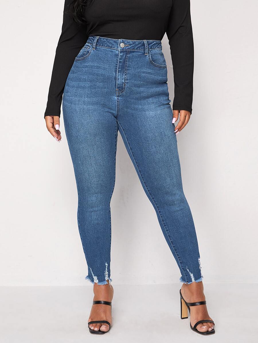 Jeans ajustados de talle alto desgarro ribete sin dobladillo - Azul lavado medio - Ver 1