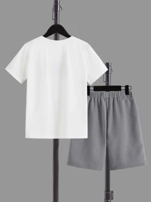 SHEIN Tween Boy Casual Printed Pattern Round Neck Short Sleeve T-Shirt And Printed Shorts 2 Piece Set
